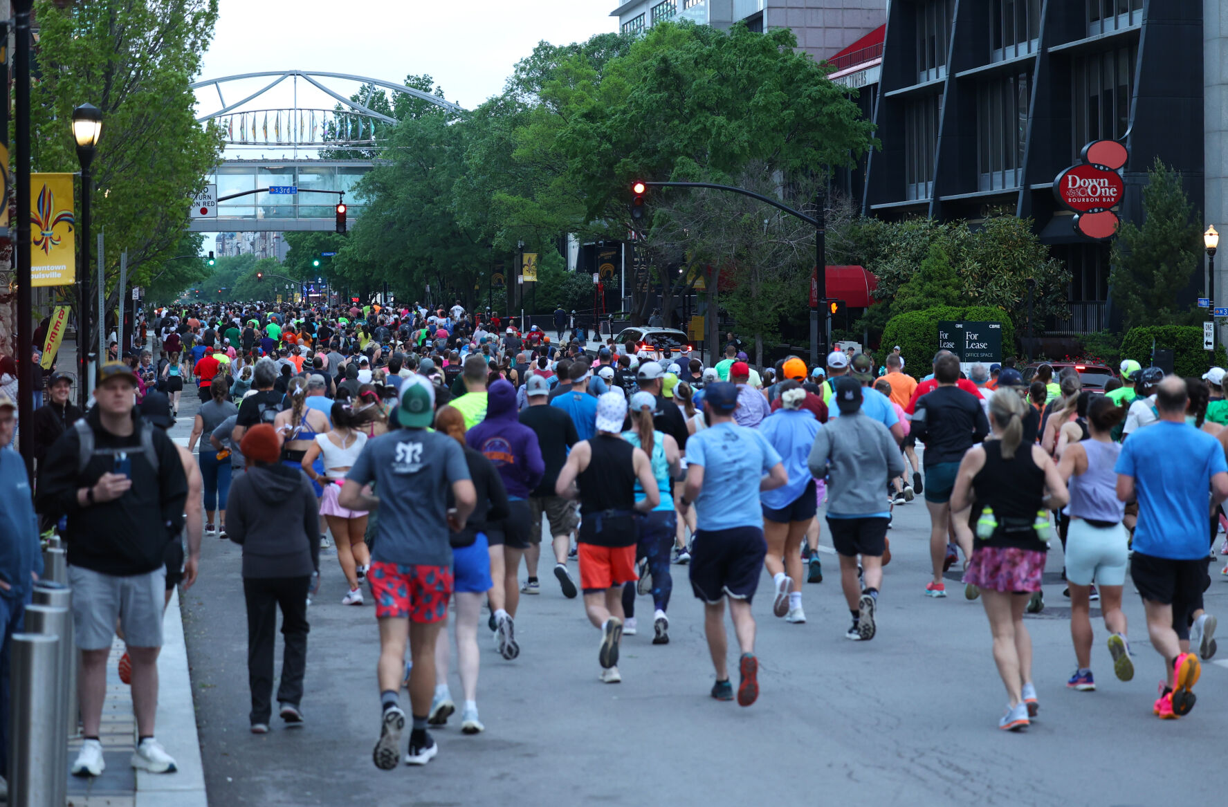 Runners go down Main Street durign Marathon.JPG
